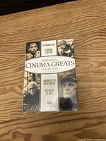 Front view of the sealed United Artists Cinema Greats DVD box set showing title and images from the four classic films included.