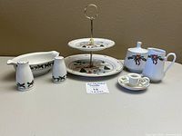 Group shot of all eight holiday ceramic serving pieces