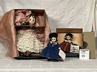 All three Madame Alexander dolls, two boxed, one unboxed, showing overall contents