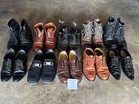 Group shot of all ten pairs of men's shoes and boots