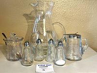 Group shot of all seven etched glass pieces