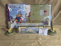 Group shot showing growth chart box, album, two cookie stamps