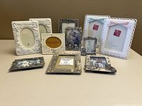 Group shot of all eleven frames on table