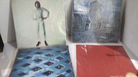 Four The Who vinyl albums displayed together showing various cover art