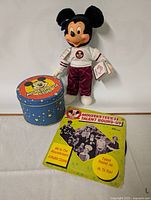 Full view of Mickey doll, music box and vintage record