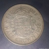 Reverse side of 1956 Half Crown coin showing crowned shield and inscriptions including date 1956.