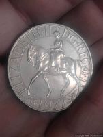 Obverse side showing Queen Elizabeth II on horseback with year 1977.