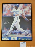 Full view of the framed Sports Illustrated poster featuring Bo Jackson in Kansas City Royals uniform mid-swing.