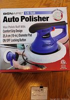 Photo of original box front showing BonAire 120 Volt Auto Polisher description, kit includes 5 bonnets and comfort grip design.