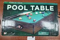 Box for Go! Games Tabletop Pool Table showing graphic of the table with balls and cues on the front and original box wear.