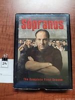 Front cover photo of The Sopranos Complete First Season box set with main character image and title text