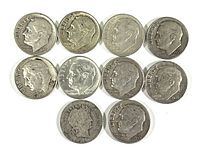 Obverse view of 10 silver dimes including 9 Roosevelt dimes and 1 Barber dime showing worn profiles and dates.