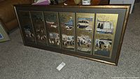 Full view of six panel framed Asian art showing all panels with bamboo style frame.