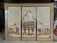 Full view of the three framed Agranat wall art panels arranged side by side showing their design and framing.