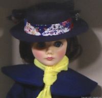 Close-up of the Mary Poppins doll's face showing facial detail and hat
