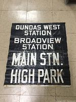 Front view showing full sign with all station names