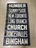 Front view showing painted canvas with stops: Humber, Sunnyside, New Toronto, Long Branch, Church, Roncesvalles, Bingham