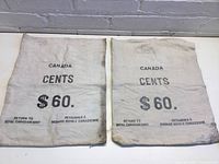 Two vintage cloth money bags side by side showing text and condition.