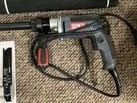 Senco SG4100 electric screwdriver with power cord and side handle