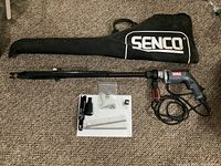 Overview of all components: screwdriver, extension shaft, carrying case, accessories