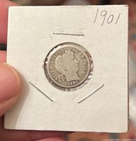 Front side of 1901 Barber dime showing worn Liberty head and date.