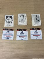 Three signed Donruss 1990s Chicago Cubs baseball cards with certificates of authenticity placed below each card.