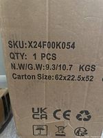 Photo of cardboard box with SKU and packaging details for chair.