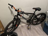 Front-side view showing frame, fork, handlebars and front wheel