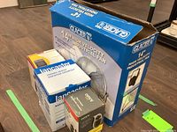 Overall view of the 14 inch Glacier Pro industrial fan box and two heater boxes, showing brands and sizes of items.