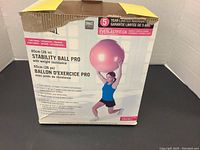 Box of 26-inch Stability Ball Pro with weight resistance, showing brand Everlast and usage instructions.