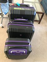 Three cases stacked vertically showing small, medium and large