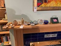 Overview of the lot displayed on mantel showing all items