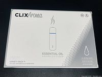 Box front showing CLIX Aroma branding and indication of essential oil aroma diffuser.