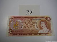 Front side of the 1974 Canadian $2 bill showing Queen Elizabeth II and denomination details.