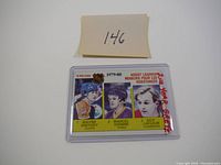 Front view of the 1979-80 O-Pee-Chee NHL hockey card featuring Wayne Gretzky along with Marcel Dionne and Guy Lafleur, highlighting assist leaders of the season.