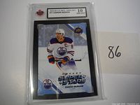 Front side of one Connor McDavid hockey card graded Gem Mint 10 in protective holder with logos and player action image