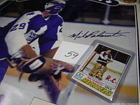 Close-up of Mike Palmateer rookie card with crease placed on the poster.