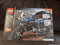 Front of LEGO Technic box showing BMW Motorrad R 1200 GS Adventure motorcycle model with 603 pieces for ages 10-16.