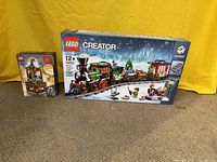 Both sealed set boxes side by side