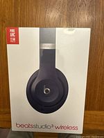 Front view of box showing the black Beats Studio 3 wireless headphones with Pure ANC 22 HR battery life tag