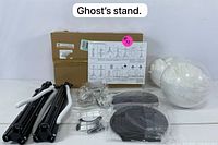 Photo of all main kit components including tripod legs, ghost heads, inflatable balls, mounting parts, and original packaging box