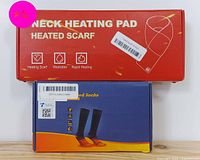 Boxed neck heating pad heated scarf and heated socks original packaging.