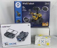 Lot showing the boxed Ferietelf B15 Drone, GAN 356 i Carry 3x3 cube, and Sillbird 3in1 robot kit in unopened retail packaging