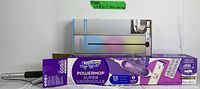 Photo shows boxed LED bathroom faucet (stainless steel, color-changing LED lights) and boxed Swiffer Powermop Super Mop (purple and white)