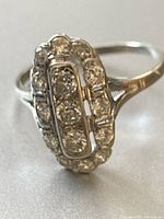 Angled top view showing diamond cluster and shield shape