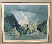 Close view of print showing landscape composition in greens and blues