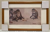 Framed print with protective corner guards on frame, showing full artwork and frame.