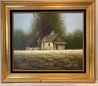 Frontal view of the framed oil painting showing the rustic barn in a rural setting with trees in the background and signature visible.