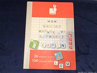 Cover of the Janod Magnet iBook showing the product name and details including count of magnets included.