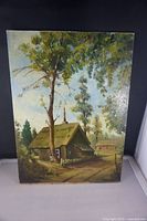 Full view of the vintage oil painting showing the cottage, tall tree, and surrounding landscape.